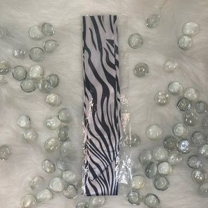 Handbag/ hair/ neck embellishment Animal print (NWOT)